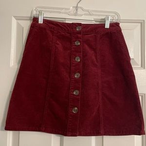 Maurice’s Burgundy corduroy button up mini skirt.